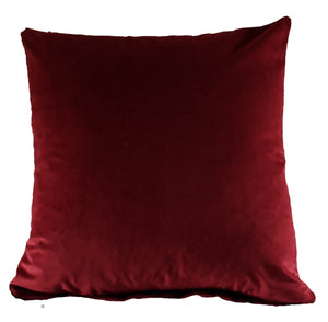 Peacocks in red velvet cushion