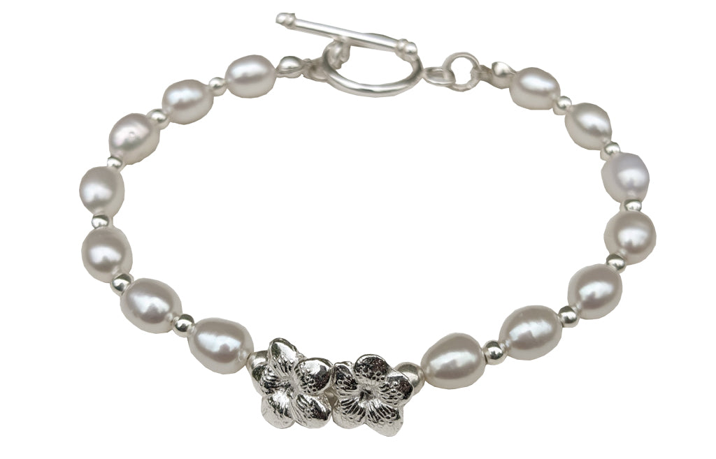 Ivory, white Freshwater Pearl and Solid Silver flower Bracelet.