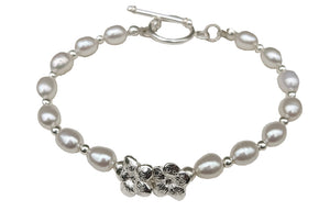 Ivory, white Freshwater Pearl and Solid Silver flower Bracelet.