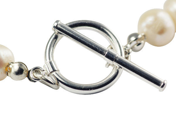 Ivory, Cream Freshwater Pearl and Solid Silver flower Bracelet.